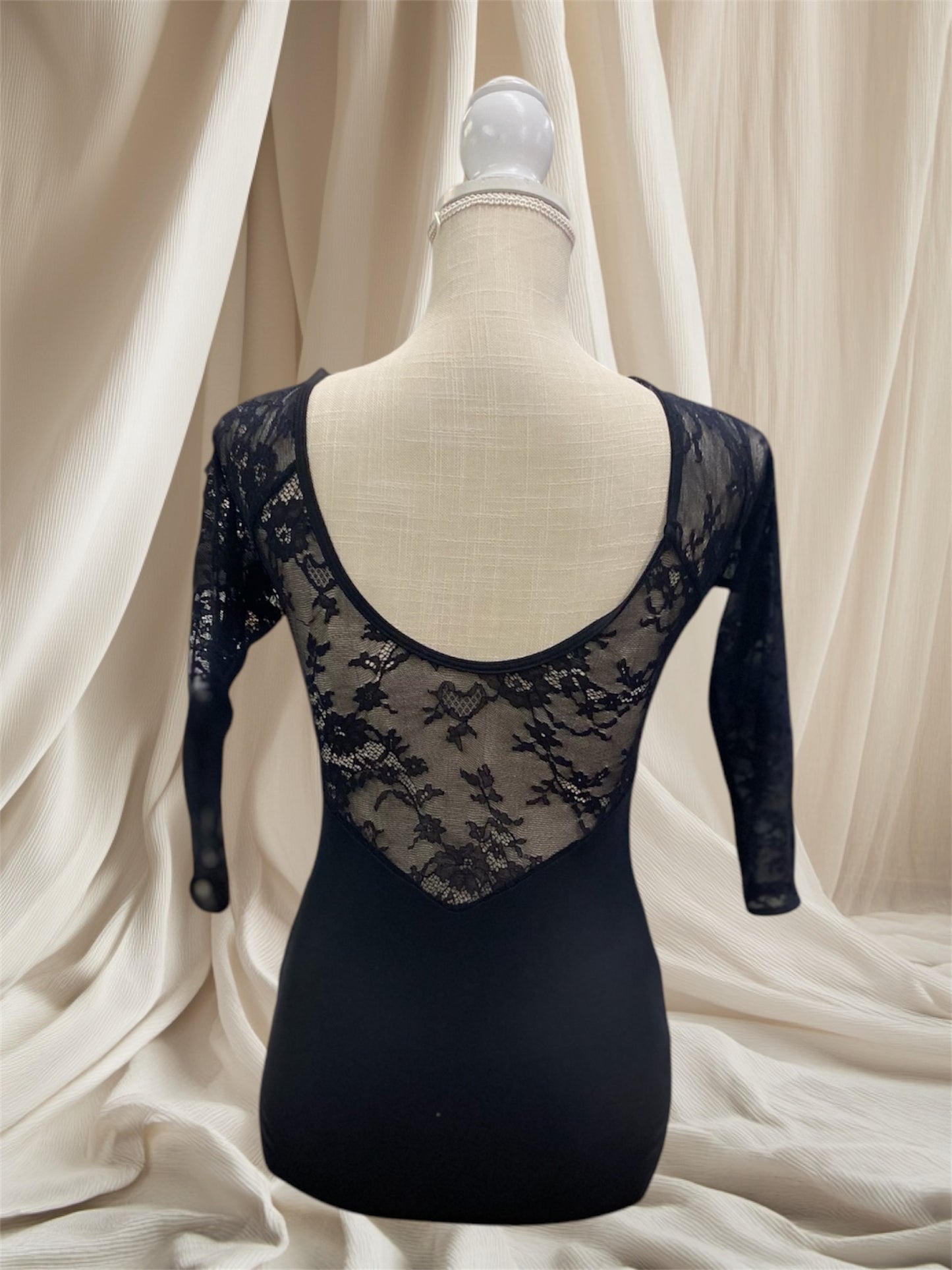 CLASS IN CLASSIC BLACK LACE OVER LEO